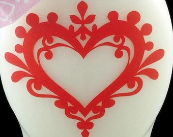 Flourish heart adhesive vinyl decal décor.  Small size; perfect for laptops, hand soap bottles, etc.