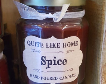 Spice scented 6.5 oz. jar candle with gold lid, and organza ribbon. Spices, cinnamon, nutmeg, cloves, baking, cozy home, housewarming gift