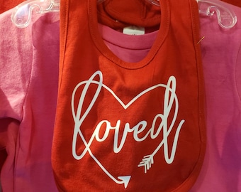 Loved surrounded by a heart shaped arrow bib- cute | valentine | Valentine's Day | red | heart | arrow | love my baby