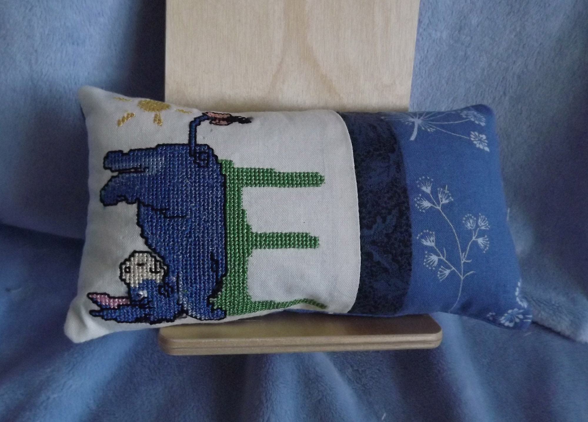 small embroidered pillow