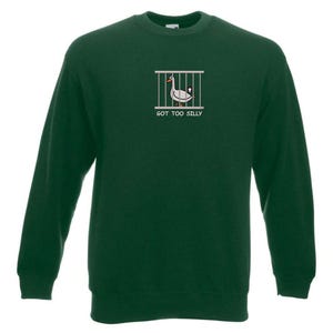 May include: A dark green sweatshirt with a white graphic of a goose in a cage. The text "GOT TOO SILLY" is printed below the graphic.