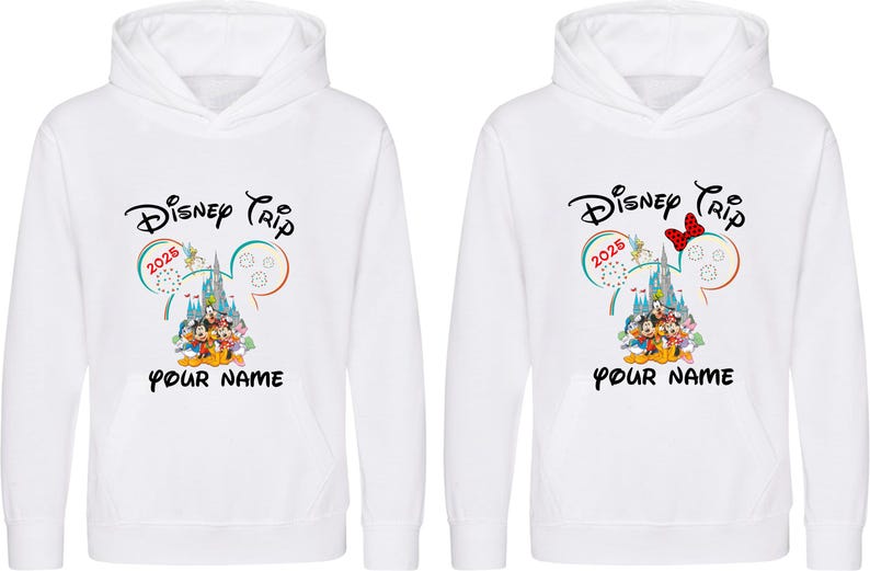 May include: Two white hooded sweatshirts with a Disney Trip design. The design includes the text "Disney Trip 2025" and a castle graphic with Disney characters. The bottom of the design has space for a name.