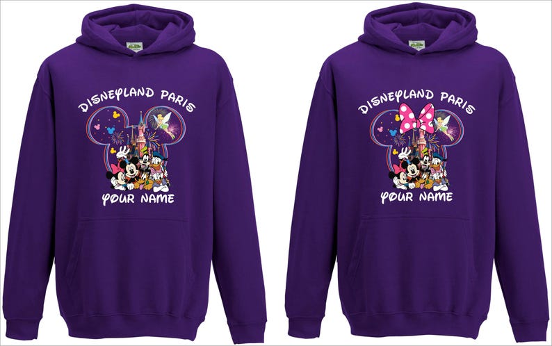 May include: Two purple hoodies with a Disneyland Paris design. The design features Mickey Mouse, Minnie Mouse, Donald Duck, and other characters. The text "Disneyland Paris" and "Your Name" are also printed on the front.