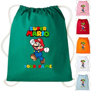 May include: A green drawstring bag with a Super Mario design. The image shows the words "SUPER MARIO" and "YOUR NAME" alongside a cartoon image of Mario. Other bags in pink, red, orange, white, and blue are also visible.