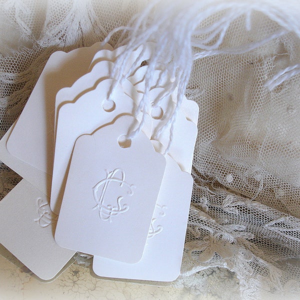 one dozen embossed vintage string tags G C or C G embossed by hand using antique embosser beautiful script vintage white paper string tags