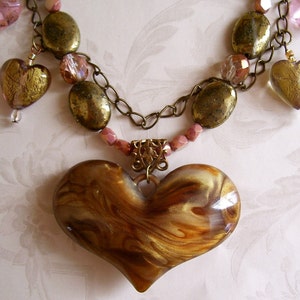 Love Conquers All Necklace