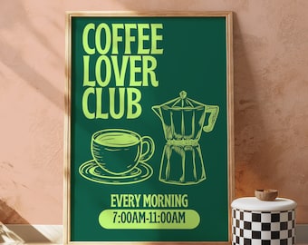 May include: A green chalkboard sign with a wooden frame advertising a "Coffee Lover Club" that meets every morning from 7:00 AM to 11:00 AM. The sign features a green coffee cup and a green and white coffee pot.