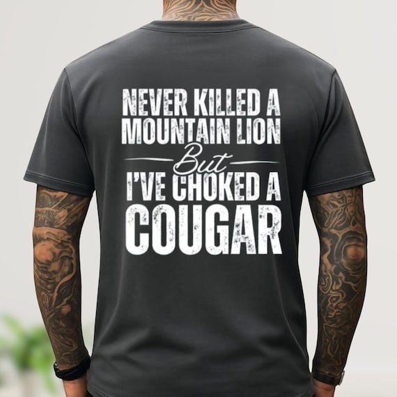 Funny Never Killed A Mountain Lion Comfort Colors® Shirt | But I've Choked A Cougar | Trending Meme Sarcastic y2k Viral Men's Shirt Tee