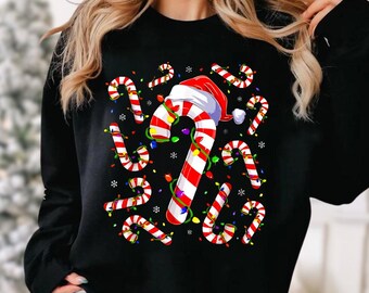 Camiseta navideña con gorro de Papá Noel y luces de bastón de caramelo, sudadera festiva navideña, sudadera Feliz Navidad, regalo de Navidad