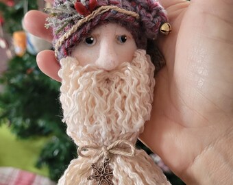 Adorno de Papá Noel con cara esculpida suave