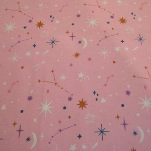 Celestial Icons by POP - Snuggle Flannel Fabric BTY - Stars and Constellations on Pink