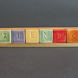 1&quot; x 1&quot; word tile with wood stand