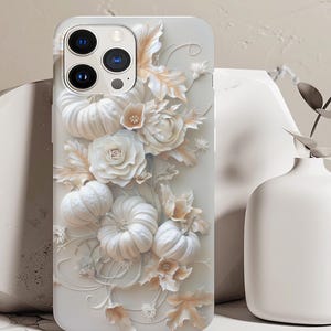 cream-colored phone case with pumpkins and flowers, a 3D effect, a glossy finish, detailed texture, an elegant design, a sophisticated style, high resolution, and intricate details
