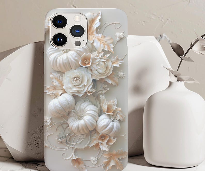 cream-colored phone case with pumpkins and flowers, a 3D effect, a glossy finish, detailed texture, an elegant design, a sophisticated style, high resolution, and intricate details