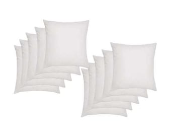 May include: A set of ten white square throw pillows. The pillows are arranged in two stacks of five.