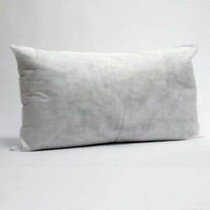 May include: White pillow insert for a standard size pillow. The pillow is made of a soft, fluffy material and is perfect for sleeping or lounging.