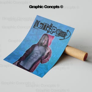 May include: A blue and white poster with a person wearing a red hooded sweatshirt and a white t-shirt with a graphic print. The text "NET$PCN" is printed in black on the poster.