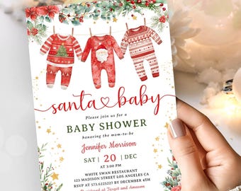 May include: A baby shower invitation with a festive Christmas theme. The invitation features three onesies hanging on a clothesline, decorated with holiday patterns. The text reads "santa baby" and details for the event.