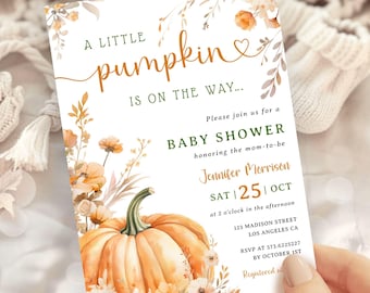 May include: Baby shower invitation with a watercolor pumpkin and floral design. The invitation reads "A Little Pumpkin is on the Way..." and includes details for the event, such as the date, time, and location.