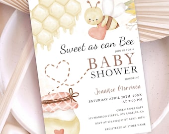 May include: A baby shower invitation with a bee and honey pot theme. The invitation says "Sweet as can Bee" and includes the text "Join us for a Baby Shower honoring Jennifer Morrison".