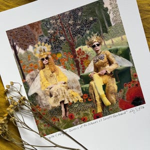 A giclee print of a quirky encaustic painting depicting two fashionably dressed queen bee women with crowns and wings sitting in easy chairs in a lush garden with red and orange flowers by SomnmigratoryStudio artist, Dominique Gustin