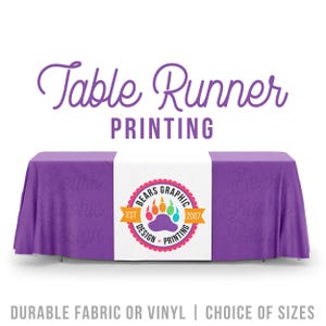 May include: A purple table runner with a white center panel featuring a colorful paw print logo. The text "Table Runner Printing" is displayed in a decorative font. The bottom of the image reads "Durable Fabric or Vinyl | Choice of Sizes."