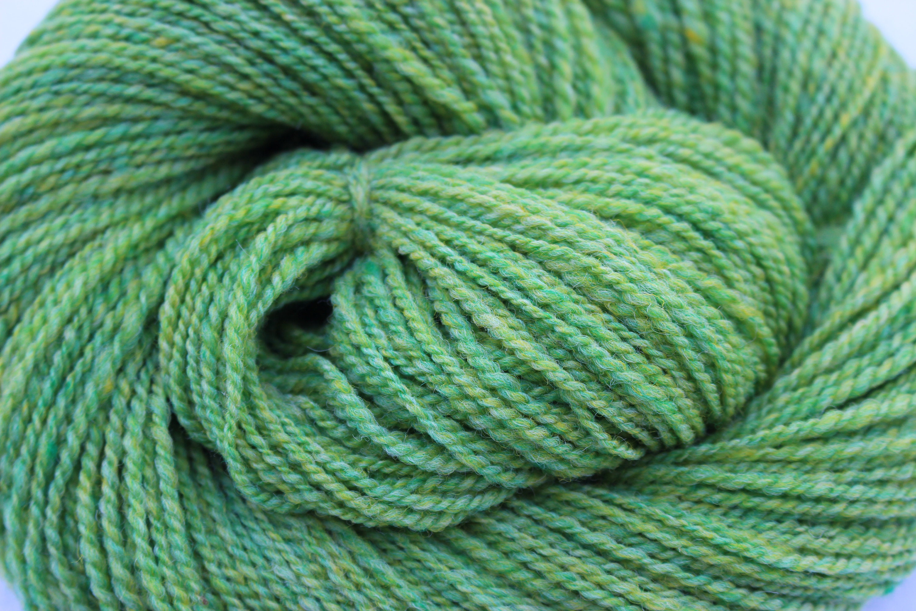 Merino wool Knitting crochet and weaving yarn. Lime at midnight Hand spun 2 ply yarn
