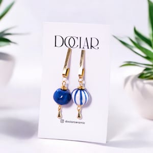 Handmade Ceramic Earrings with Blue and White Design - Gold Plated Details