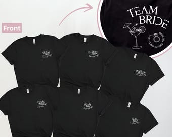 May include: Six black t-shirts with white text. The shirts say "Team Bride", "Future Bride", "Maid of Honor", and "Team Bride" with the bride's name. One shirt has the text "Team Bride" with a cocktail glass and ring graphic and the text "Last fling before the ring".