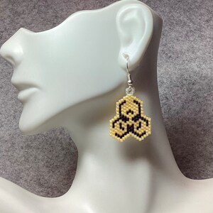 Biohazard symbol earrings