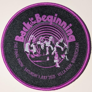 May include: Circular black patch with a purple border and text. The patch reads "Back to the Beginning" with a band illustration. Additional text includes "The Final Show - Saturday 5 July 2025 - Villa Park, Birmingham."