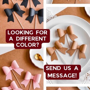 May include: Assortment of paper bow cake toppers in various colors, including black, brown, pink, red, blue, and light blue. The toppers are on wooden sticks and are perfect for decorating cakes or cupcakes. "Looking for a different color? Send us a message!"