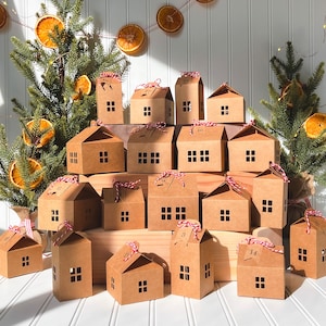 This is our Advent Calendar Village Set with 24 Kraft paper house boxes!