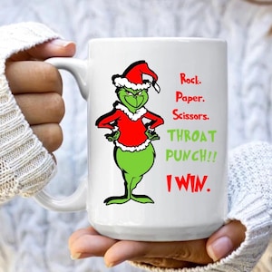 Je gagne une tasse en céramique, des ciseaux de papier de pierre et un coup de poing, allant au lave-vaisselle, au micro-ondes et à une tasse à café amusante