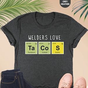 a t - shirt that says welders love tacos