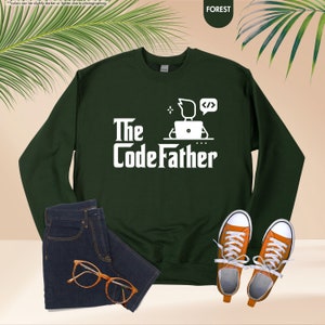 a green sweatshirt with the words the codefather on it