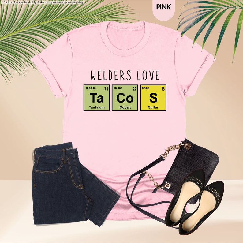 a t - shirt that says welders love tacos and a pair of