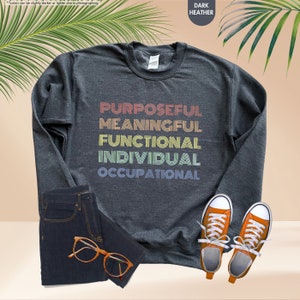 a pair of sneakers and a sweatshirt with the words, purpose, meaning, functional