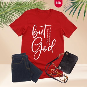 a red t - shirt with the words but god on it
