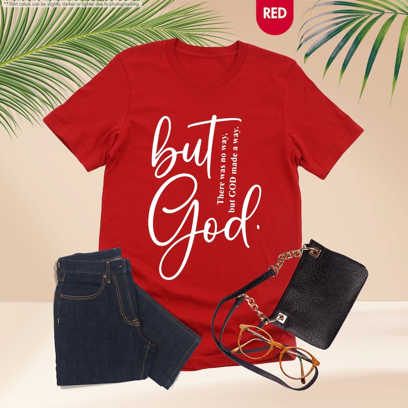a red t - shirt with the words but god on it