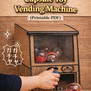 May include: A DIY cardboard capsule toy vending machine with the text "DIY Cardboard Capsule Toy Vending Machine (Printable PDF)". The machine is brown with a clear window showing red and clear toy capsules. The text "Coin-Operated Toy for Kids" is also visible.