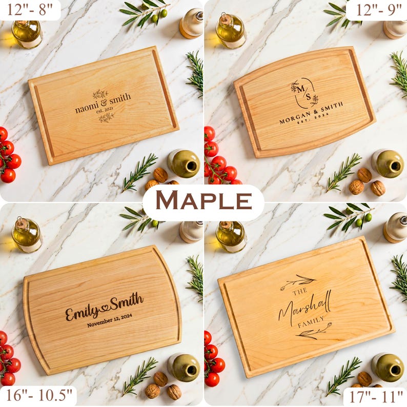 May include: Four maple wood cutting boards with engraved names and dates. The boards vary in size, with the largest measuring 17 inches by 11 inches. Each board has a different design, including floral accents and family names. The boards are surrounded by olive oil, tomatoes, and walnuts.