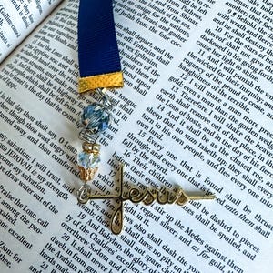 Christian Jesus name ribbon and crystal bookmark, perfect for Bible study. A meaningful jewelry piece for Bible with faith and elegance
