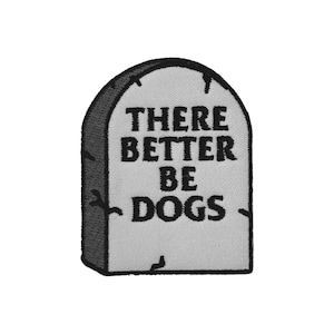 May include: A gray tombstone with black text that reads "There Better Be Dogs".