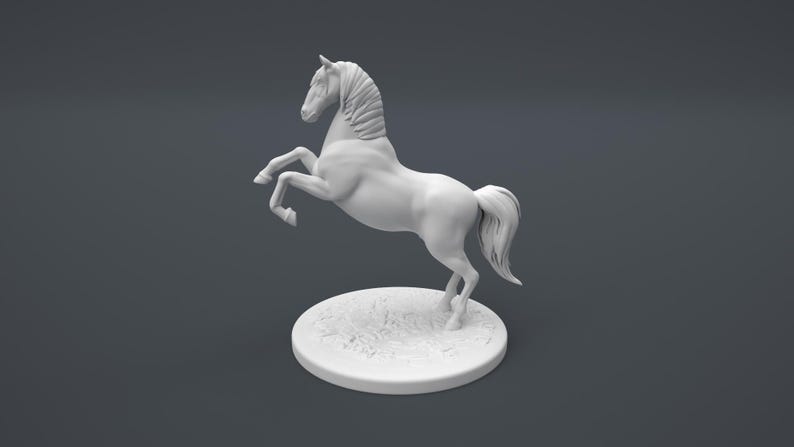 May include: White ceramic figurine of a horse rearing up on its hind legs. The horse has a flowing mane and tail. The figurine is on a round base with a textured surface.
