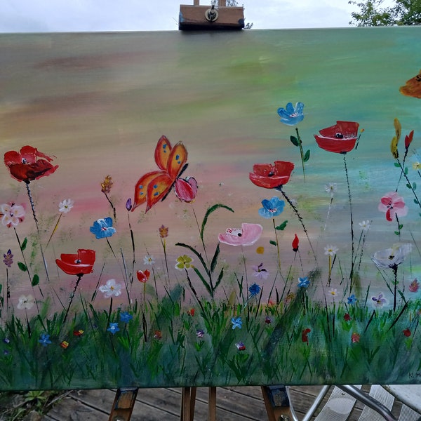 Beautiful acrylic painting on canvas of butterflies and flowers, vibrant art of butterflies and flowers on canvas, vibrant acrylic painting.