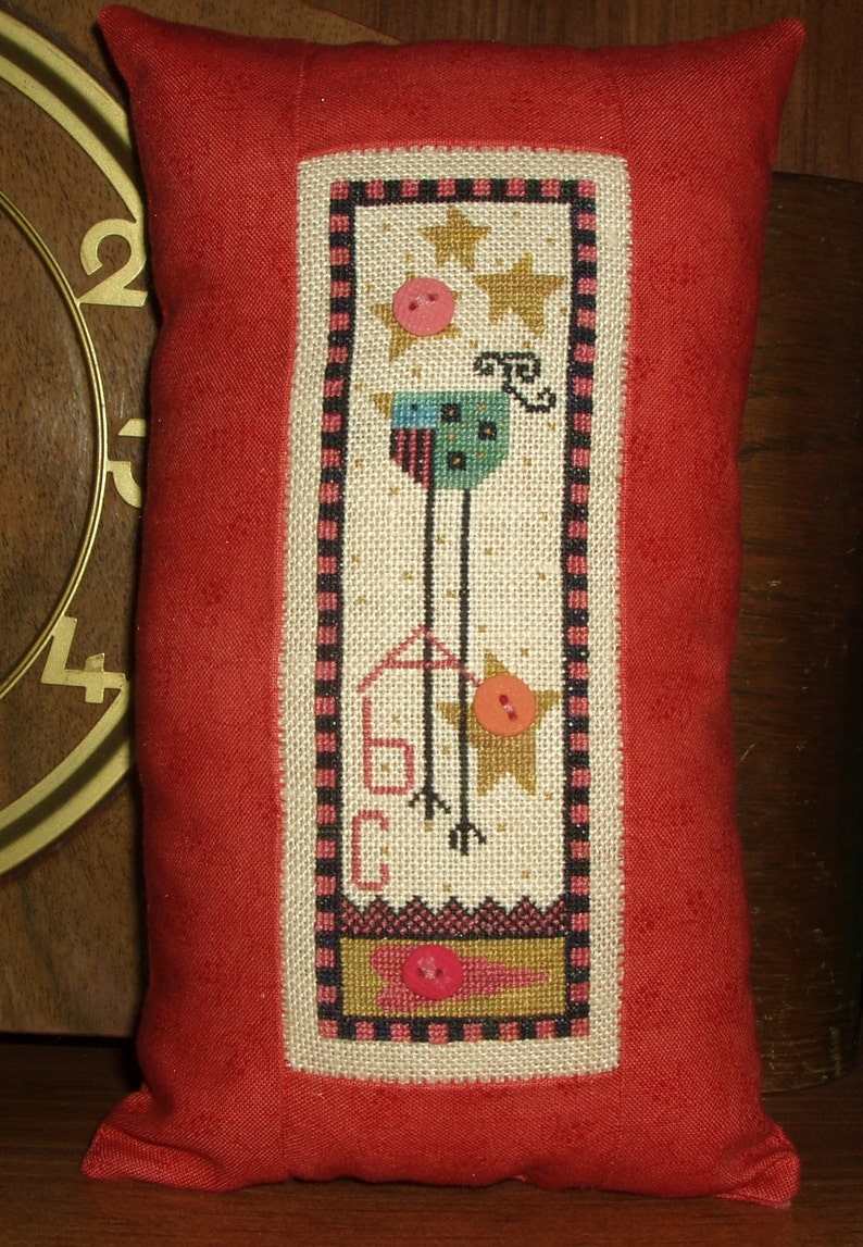 Completed Cross Stitch Ewe and Eye and Friends Pillow image 1