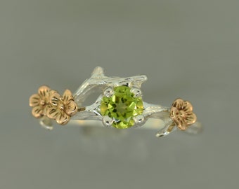 Anello di fidanzamento con fiore di ciliegio: fiori in oro rosa, fascia a ramoscello in argento sterling.