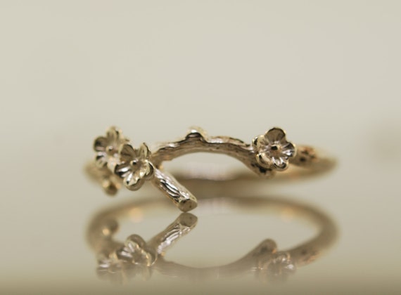Silver blossom ring deals