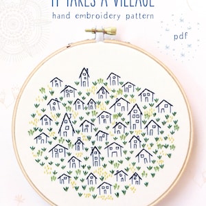 May include: Embroidery pattern for a hoop art project featuring a village of houses in a heart shape. The pattern is titled "It Takes a Village" and is available as a PDF download.